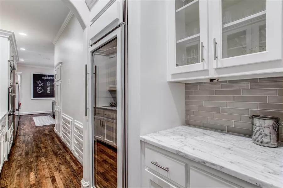 Notice the Glass-Front Cabinets in This Sleek Butler