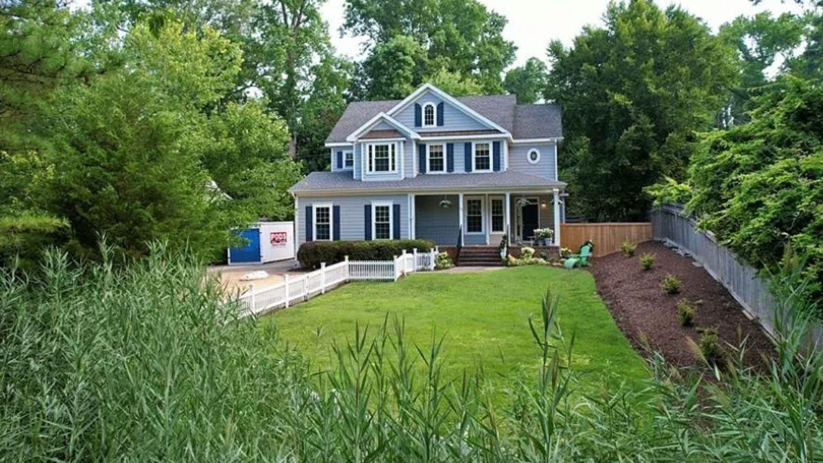 Explore the Picture-Perfect Setting of This Craftsman Gem with Blue Accents