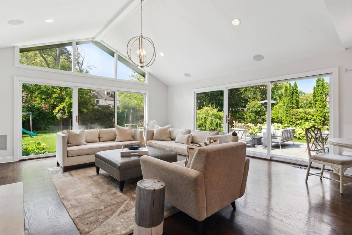Relax in a Sunlit Living Room with Expansive Glass Doors