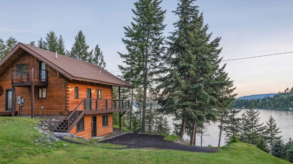 Notice the Rustic Woodwork and Balconies Blending with Lakeside Serenity