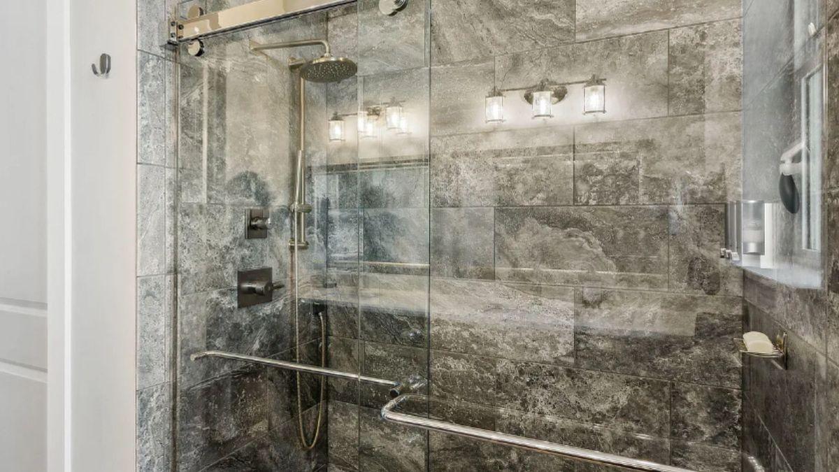 Step into the Luxury of This Marble-Clad Shower with Rainfall Showerhead