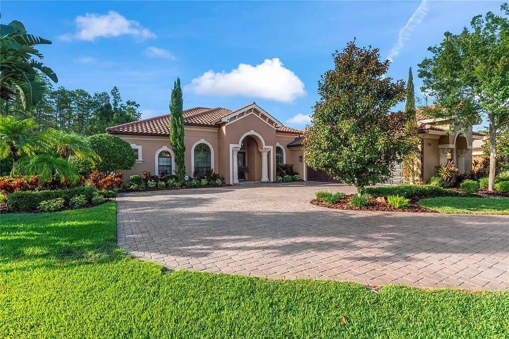 Mediterranean Flair with a Stately Arched Entrance