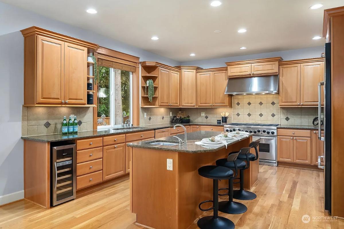 Spacious Craftsman Kitchen with Elegant Light Wood Cabinetry