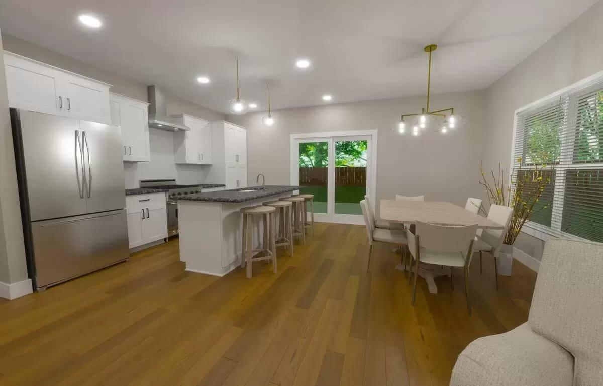 Gathering Space with an Inviting Island and Thoughtful Lighting