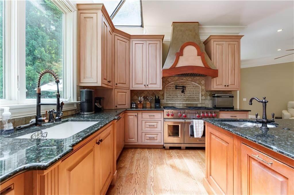 Notice the Elegant Range Hood in This Classic Kitchen