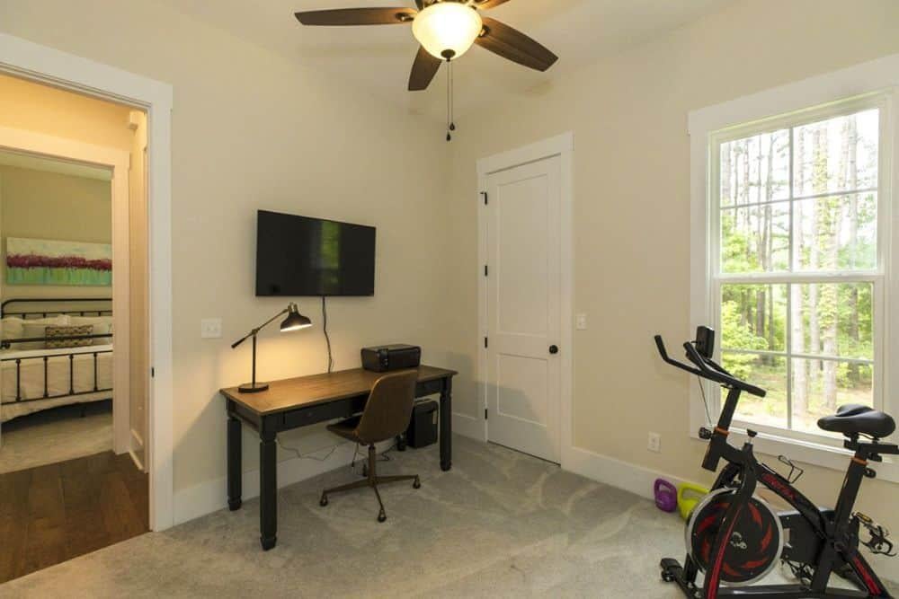 This Multi-Functional Home Office Lets You Stay Productive and Active