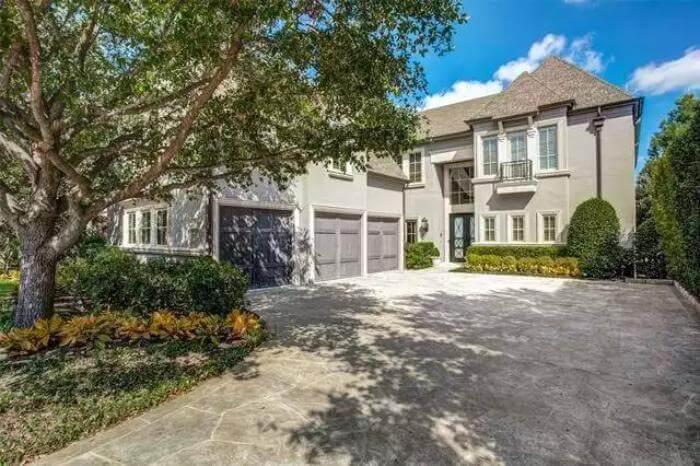 Classic Facade Featuring Elegant French Doors and Juliet Balcony