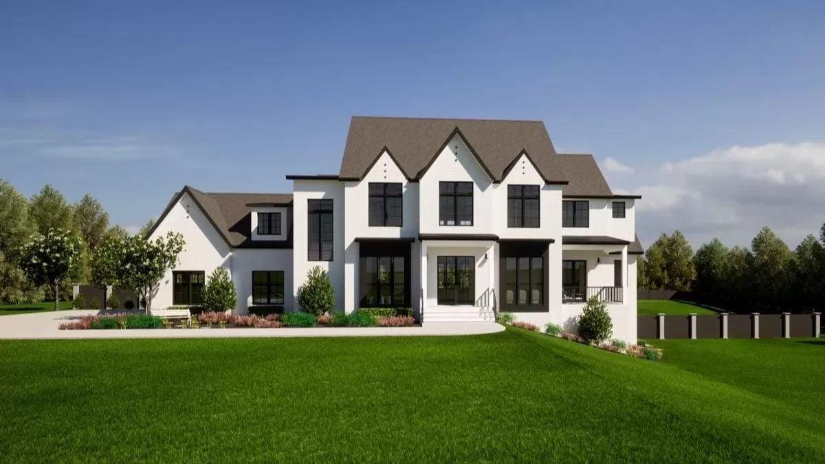 Take in the Bold Rooflines and Dark Trim of This Modern Farmhouse