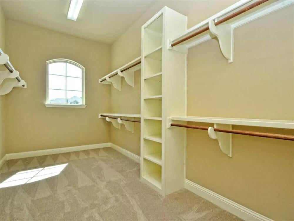 Expansive Walk-In Closet with Abundant Shelving