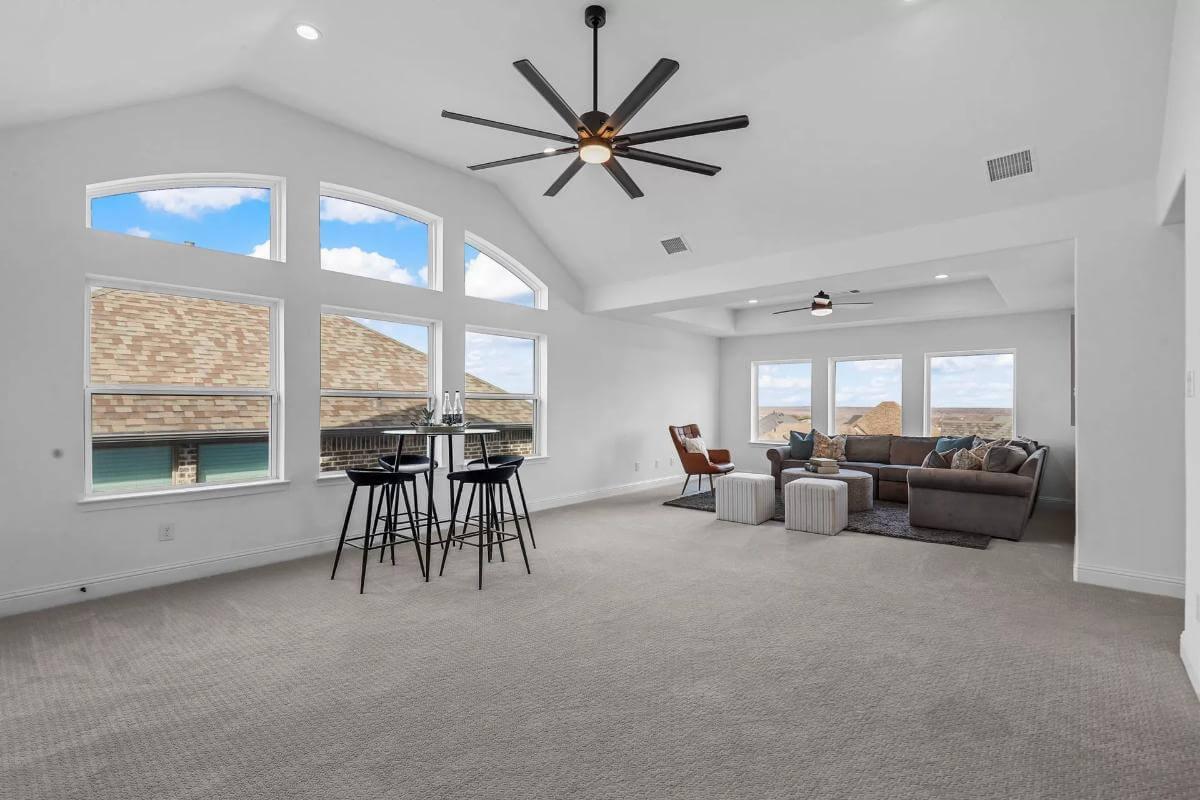 This Spacious Loft with a Vaulted Ceiling and Large Windows Is So Appealing