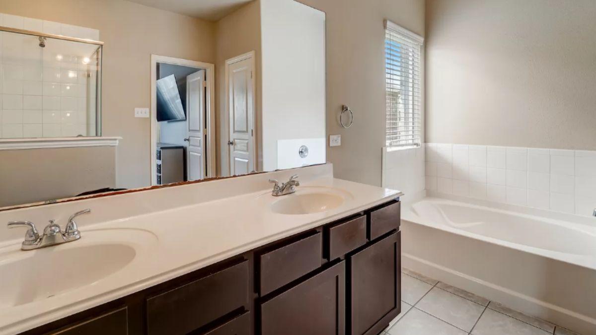 Modern Bathroom with Dual Vanity and Neutral Palette