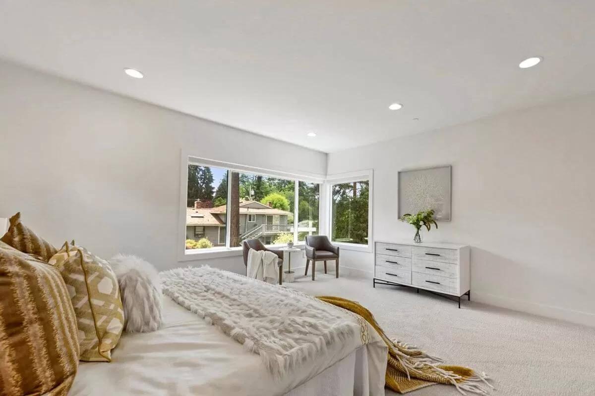 Notice the Soft Textures and Expansive Windows in This Bright Bedroom