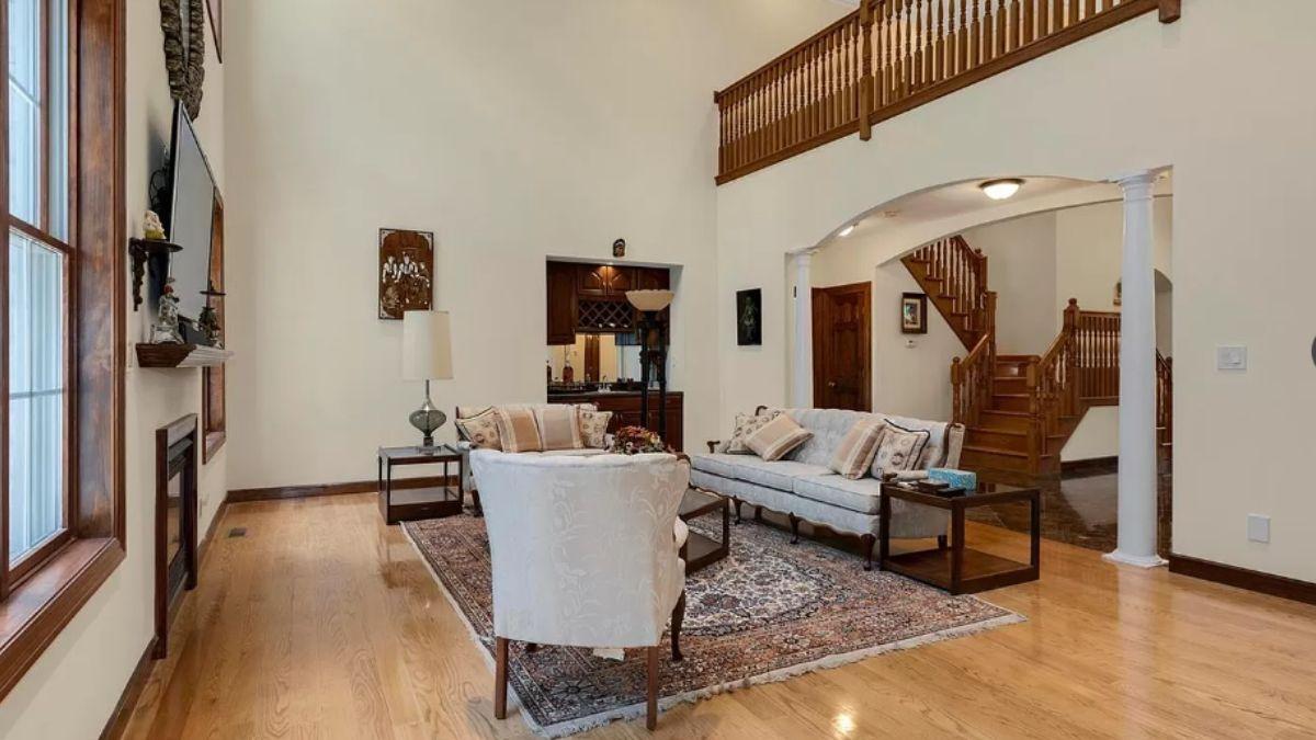 Spacious Living Room with a Vaulted Ceiling and Wooden Accents
