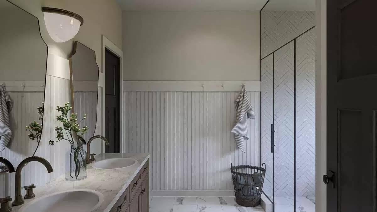 Functional Elegance: Marble Vanity and Chevron Details in This Bathroom
