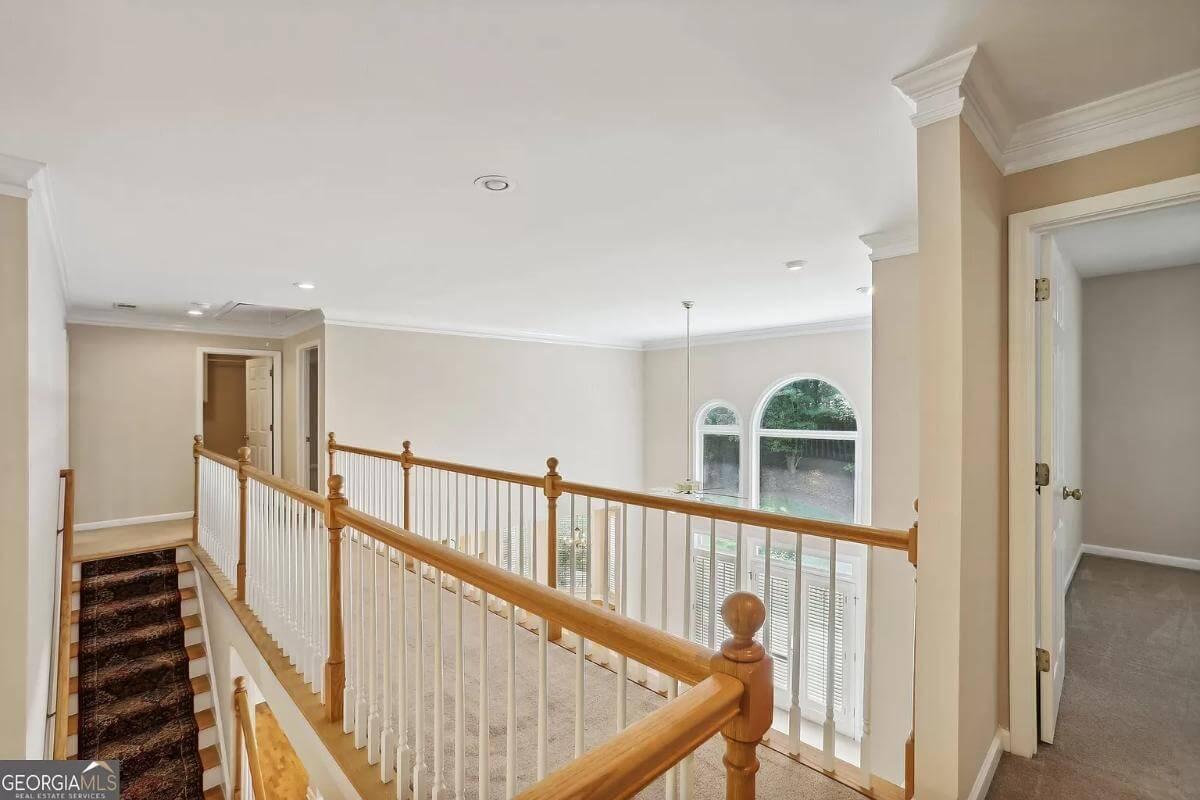 Upper Landing with Traditional Railings and Natural Light