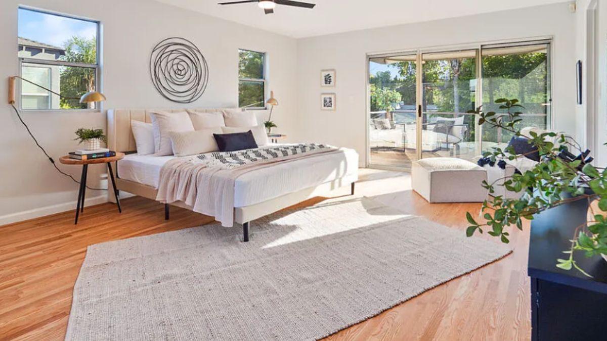 Relax in This Bright Bedroom with a Scenic Patio View