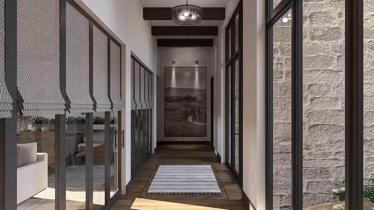 Thoughtful Design in an Inviting Hallway with Exposed Beams and Artful Details