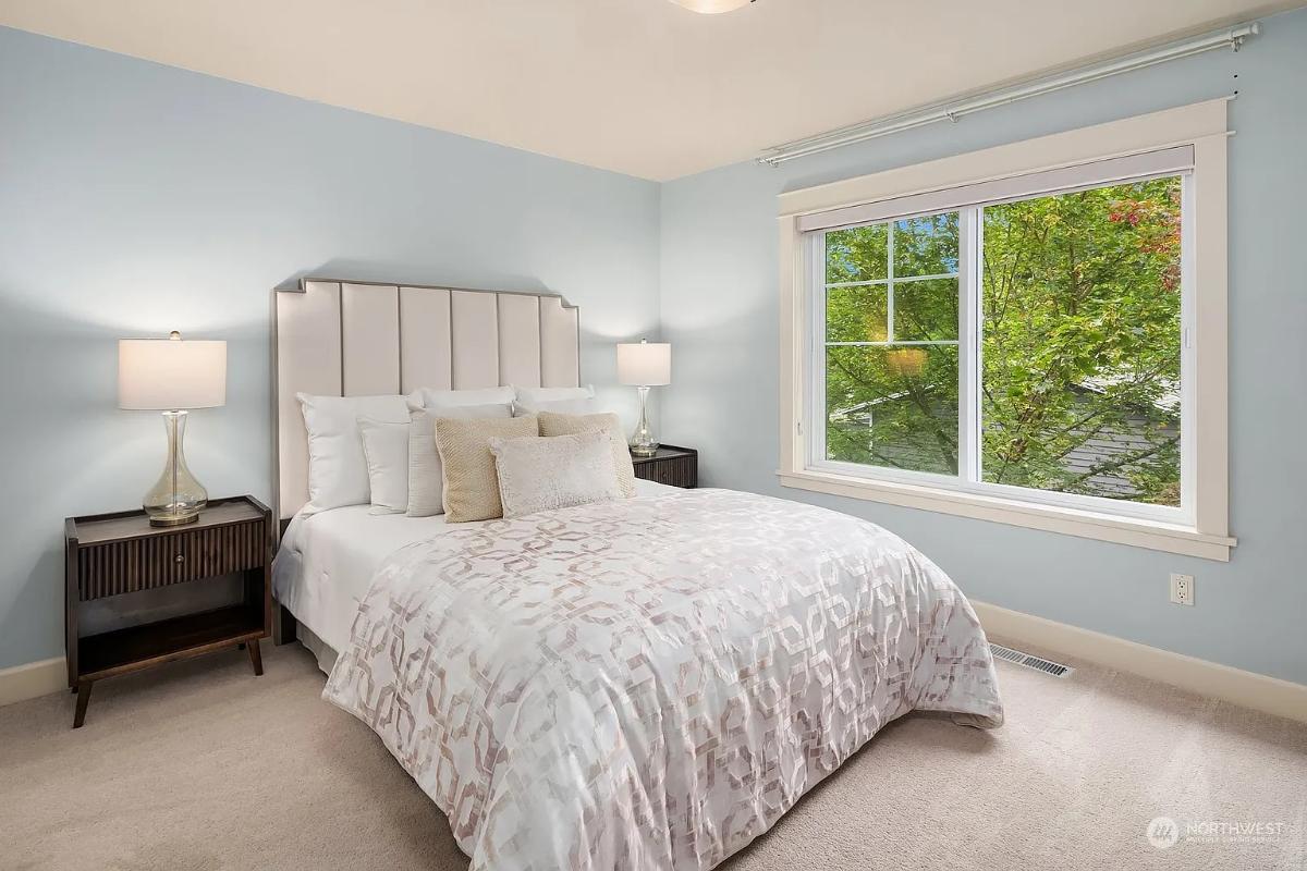 Peaceful Craftsman Bedroom with Elegant Headboard and Nature Views