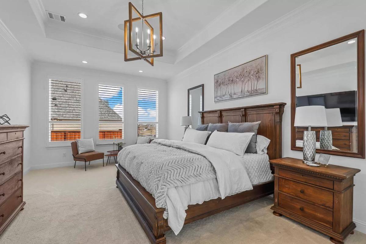 Spotlight on the Ornate Wooden Bed in This Elegant Bedroom