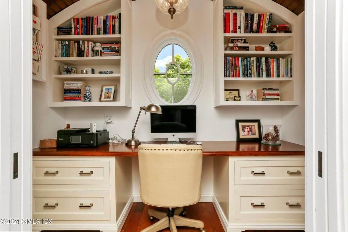 Charming Craftsman Office Nook with an Oval Window View