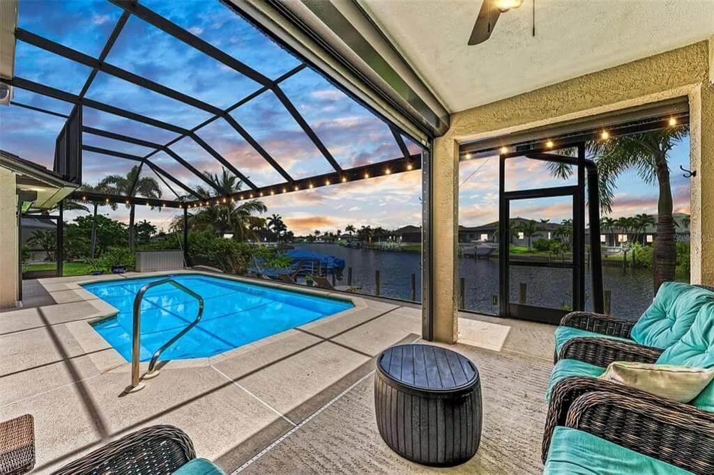 Outdoor Living at Its Finest with a Screened Poolside Retreat