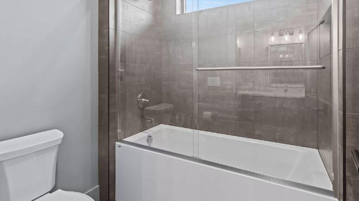 Simple Bathroom Elegance with Earth-Toned Tile