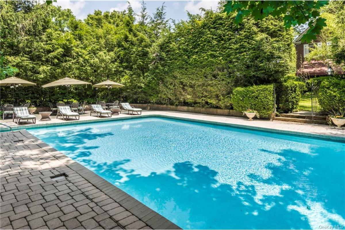 Tranquil Pool Retreat with Classic Stone Decking