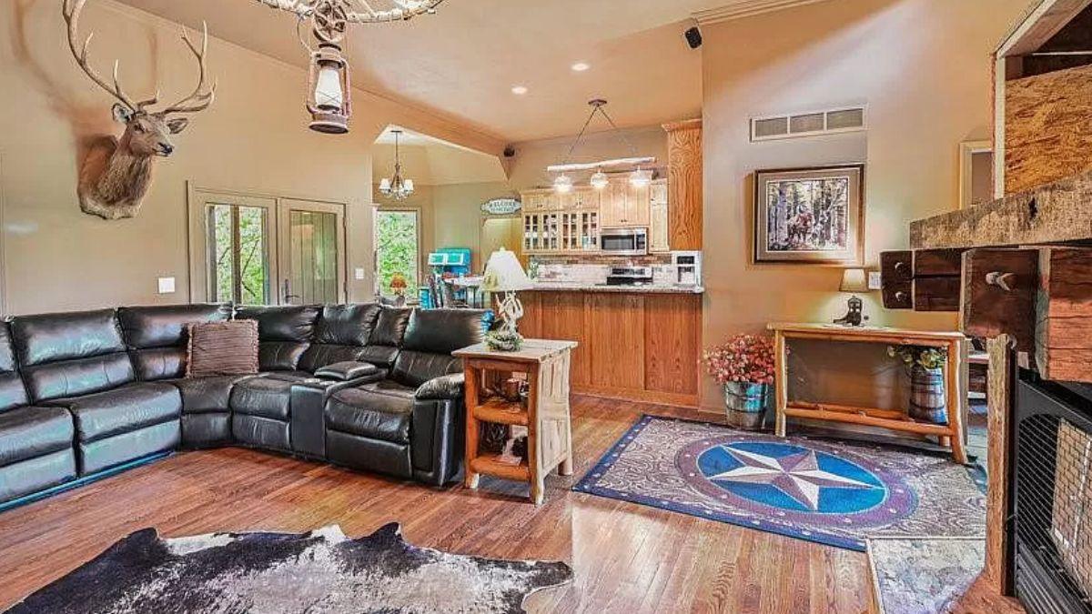 Rustic Living Room with Dramatic Antler Decor and Star Motif
