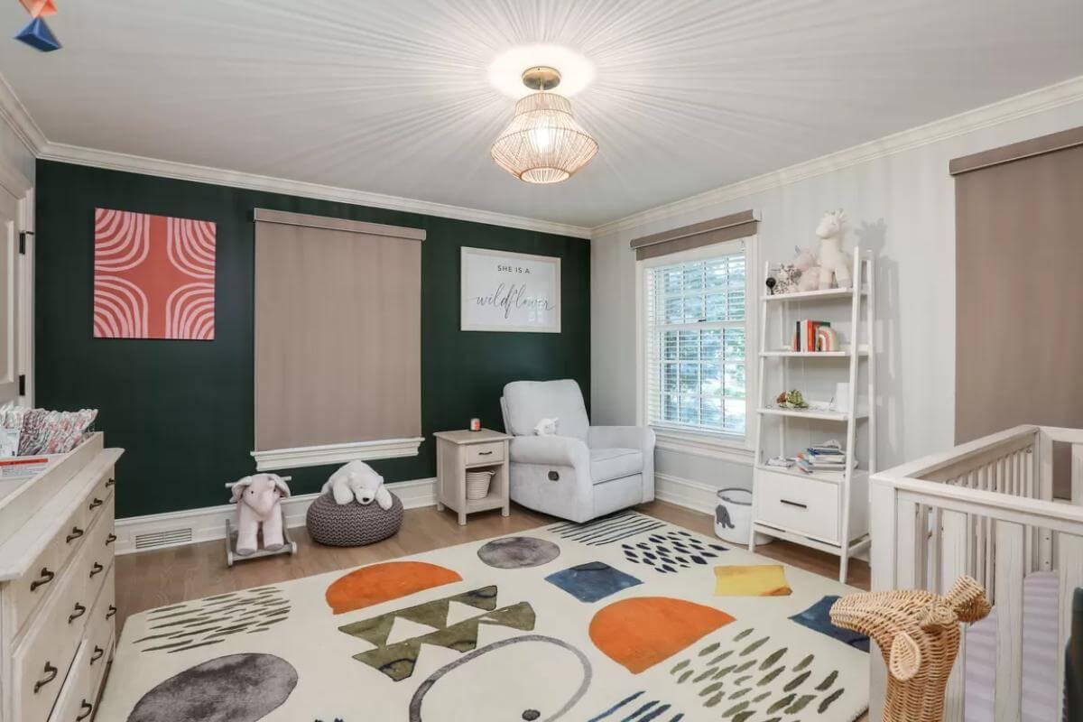 Charming Nursery Featuring a Playful Geometric Rug