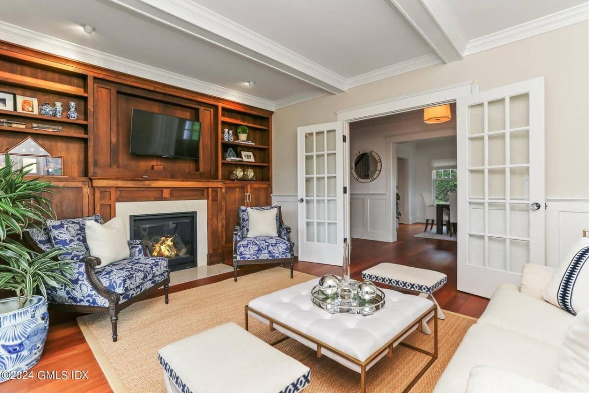 Warm Family Room with Built-In Shelving and a Cozy Fireplace