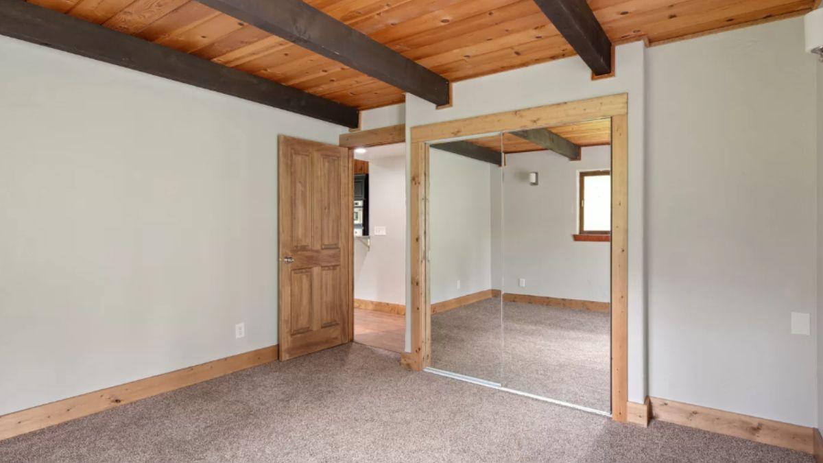 Appreciate the Rich Woods and Functional Mirror Closet
