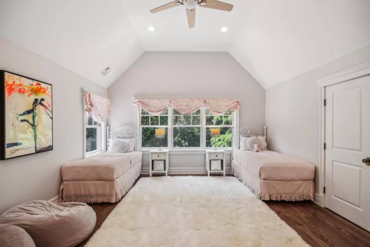 Charming Twin Bedroom with Vaulted Ceiling and Soft Hues