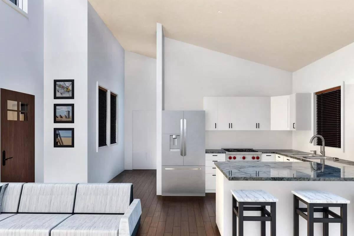 Explore This Streamlined Kitchen with Its Striking Granite Countertops