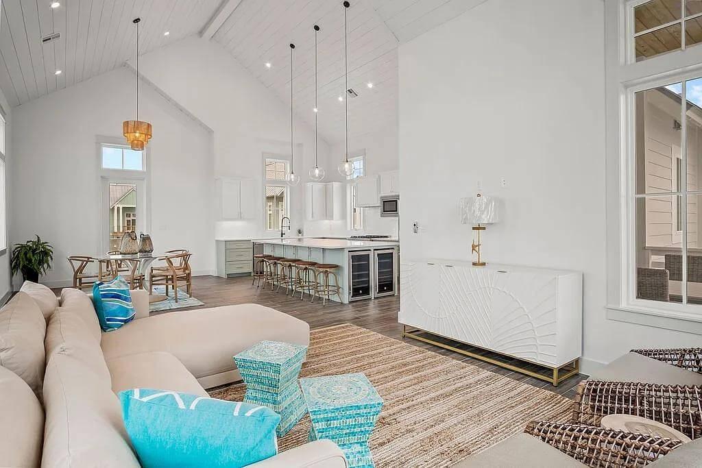 High Ceilings and Coastal Hues in This Open-Concept Living Space