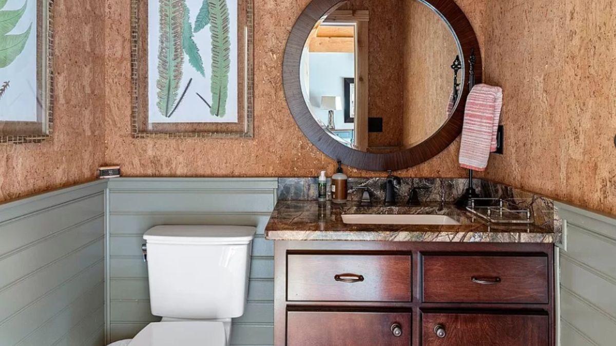 Notice the Cork Wall in This Rustic Powder Room