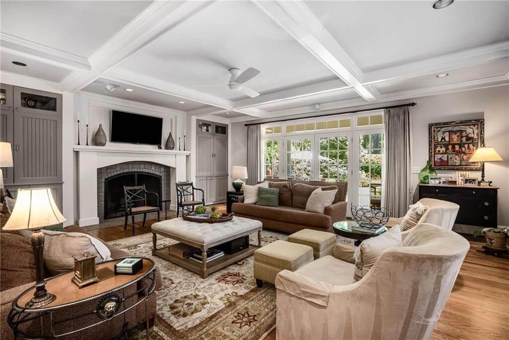 Notice the Ceiling Details and Comfortable Seating in This Cozy Living Room