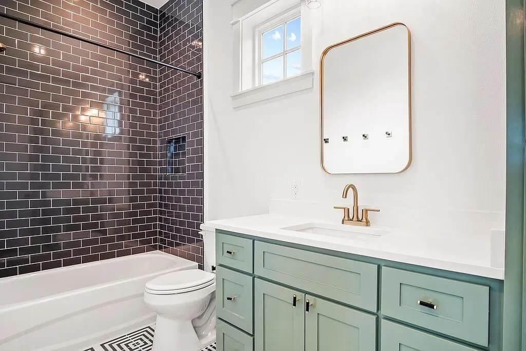 Look at the Bold Black Subway Tiles in This Modern Bathroom
