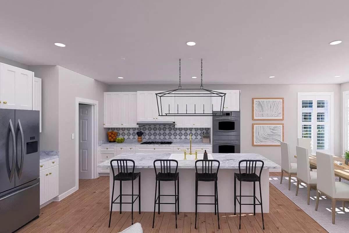 Check Out the Chic Island with Black Bar Stools in This Bright Kitchen