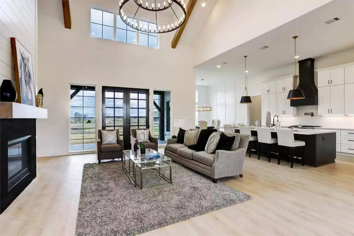 Step into This Light-Filled Great Room with Distinctive Beamed Ceilings
