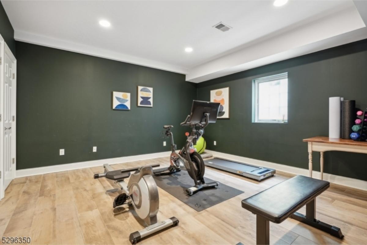 Home Gym with Dark Walls and Natural Light