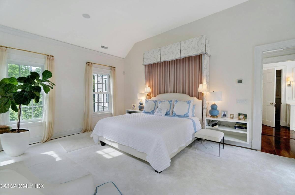 Relax in This Serene Bedroom with Canopy Accents