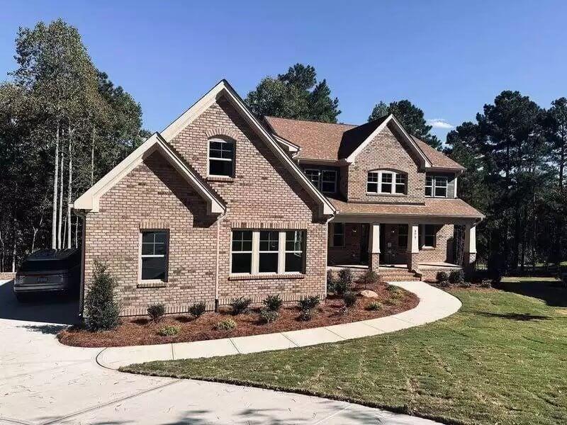 Classic Brick Facade with a Charming Front Porch