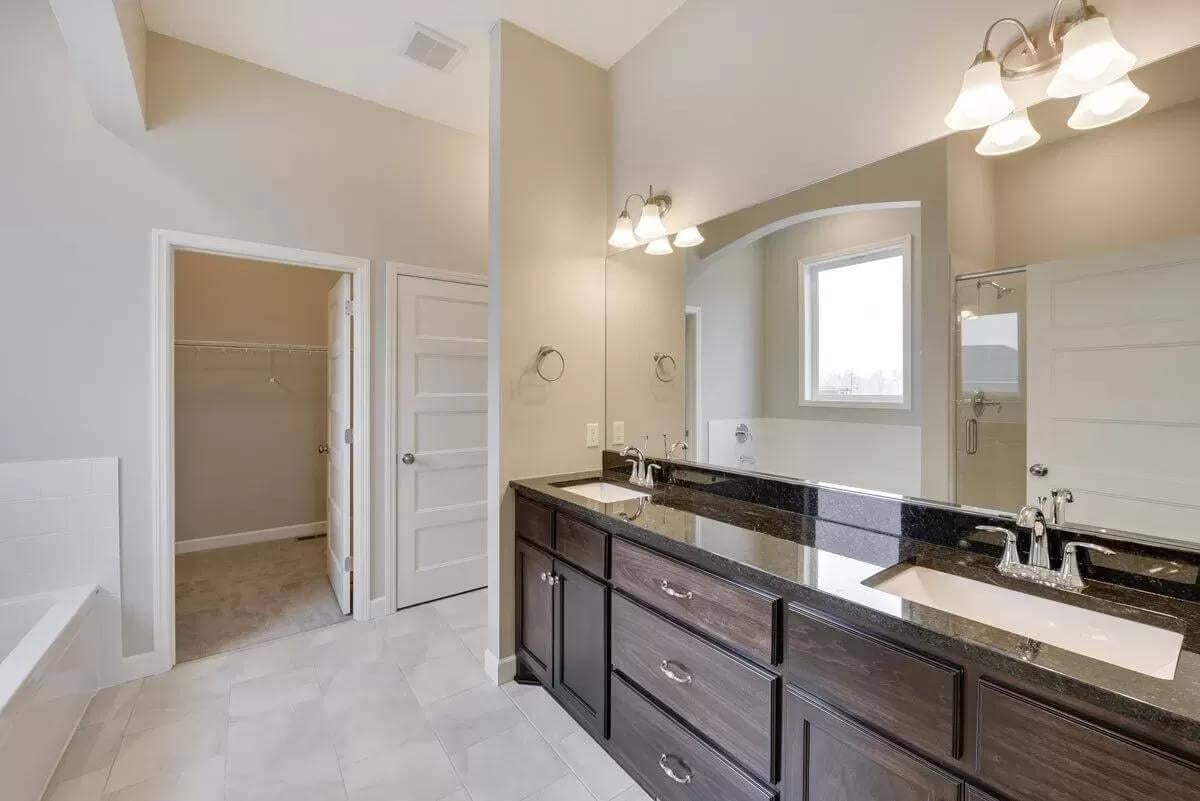 Explore the Dual Sink Vanity in This Elegant Craftsman Bath