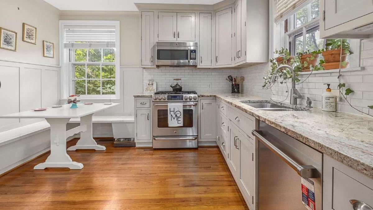 Cozy Kitchen Nook with Bench Seating and Granite Counters