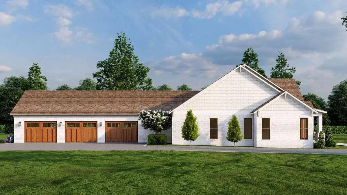 Take a Look at the Expansive Three-Car Garage with Wooden Doors