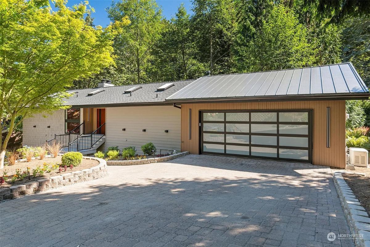 This Craftsman Exterior Shines with Unique Vertical Wood Paneling