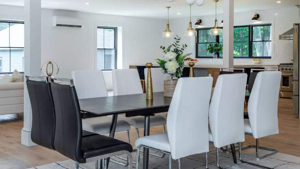 Modern Dining Room with Color-Blocked Seating and Pendant Lighting