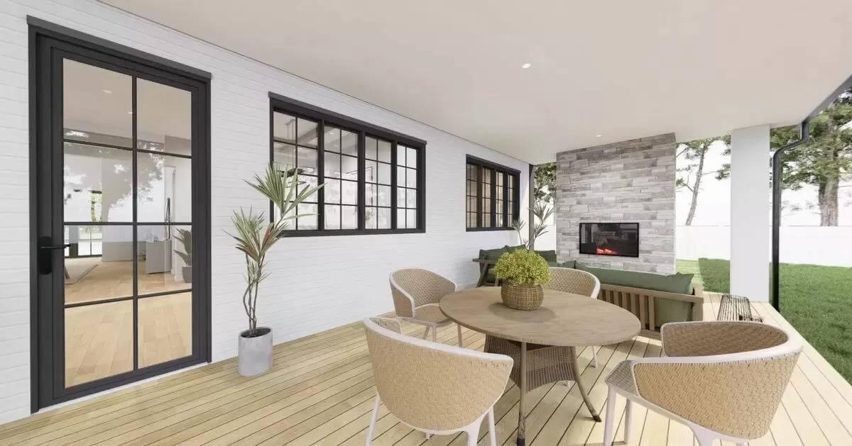 Enjoy the Covered Deck with Its Stylish Stone Fireplace