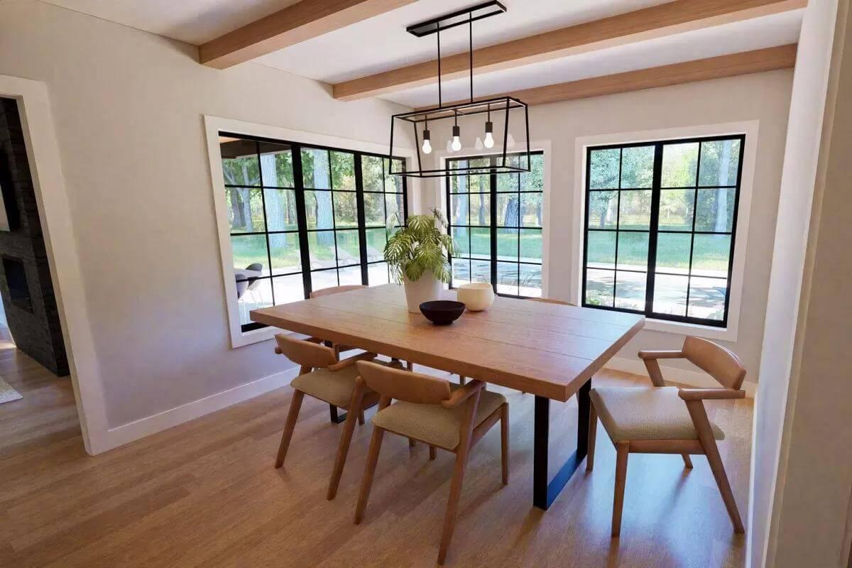Open Dining Room with Bold Black Accents and a Touch of Nature