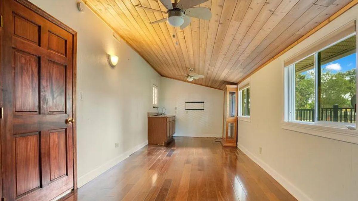 Admire the Warmth of a Wood-Clad Ceiling in This Sunlit Retreat
